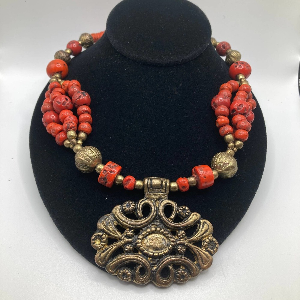 Ethnic red stone bead necklace brass pendant tribal wrapped button closure